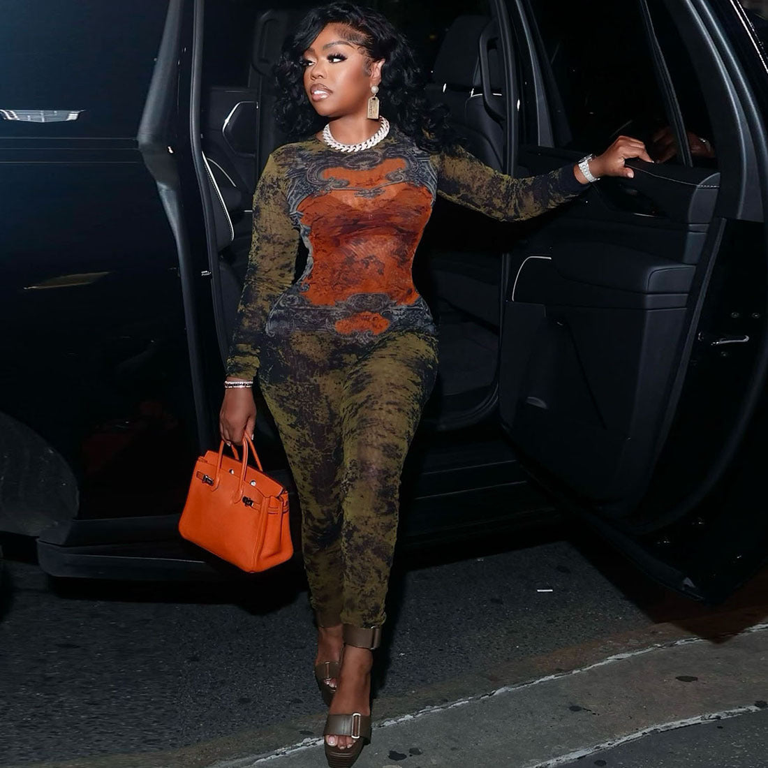 “MeshGlam Printed Zip-Up Long Sleeve Jumpsuit”