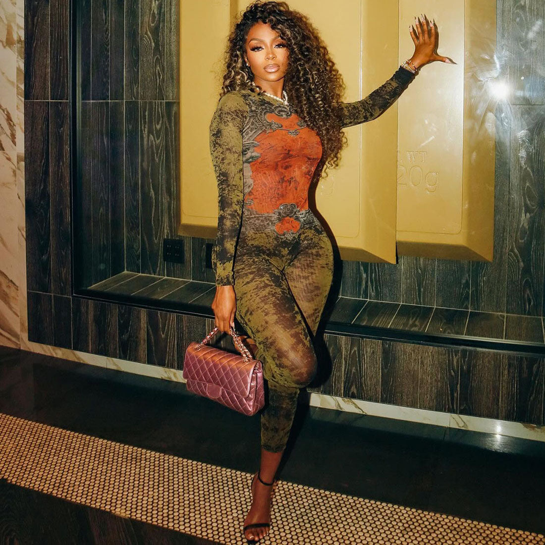 “MeshGlam Printed Zip-Up Long Sleeve Jumpsuit”